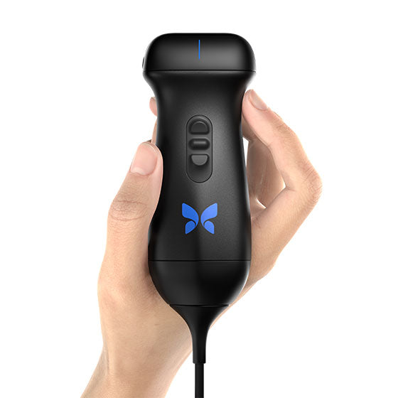 Black handheld ultrasound device with a blue butterfly logo held in a hand on a white background